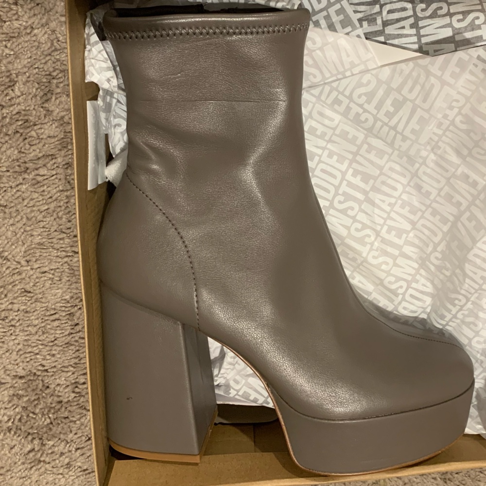 Platform booties. Brand new in box. 8.5 taupe color